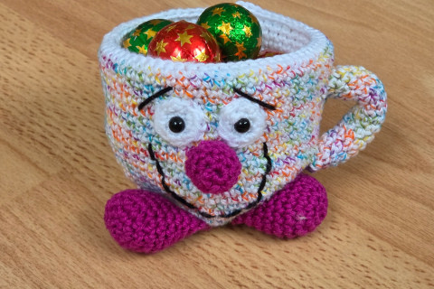 Grinsetasse melliert himbeer